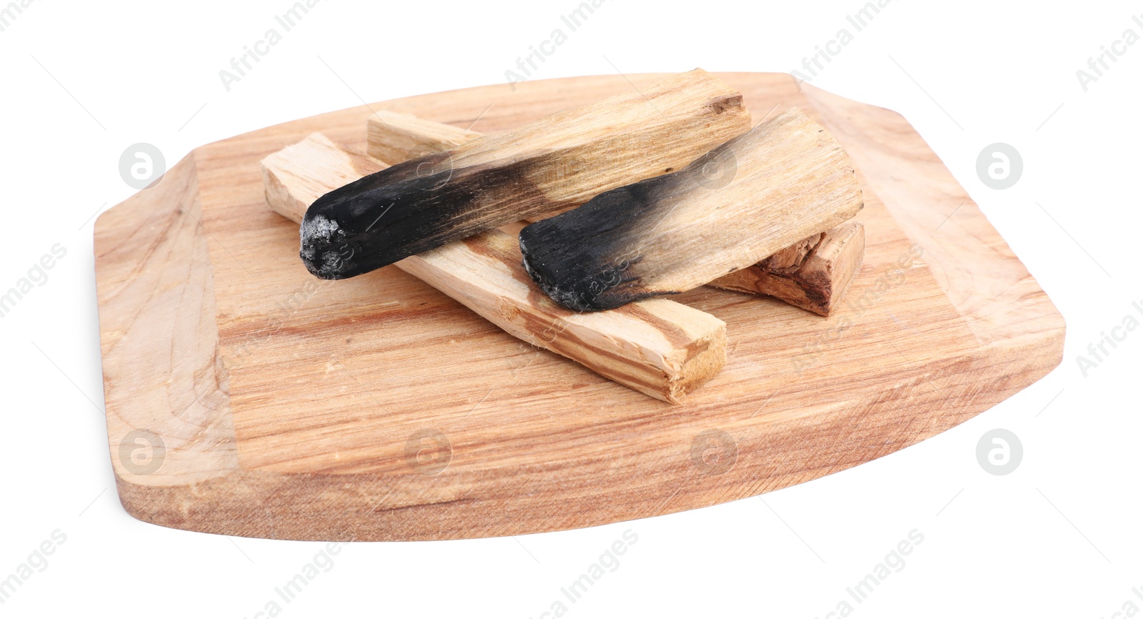 Photo of Whole and burnt palo santo sticks on white background