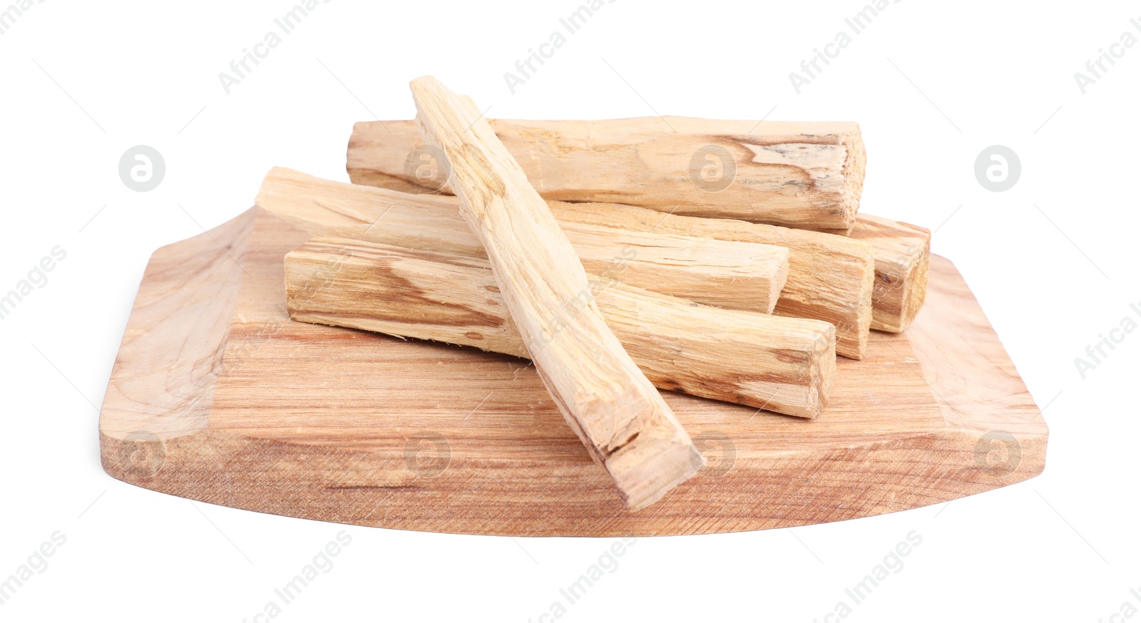 Photo of Many palo santo sticks on white background