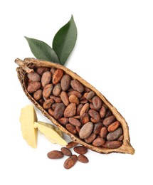 Cocoa pod with beans, butter and leaves isolated on white, top view