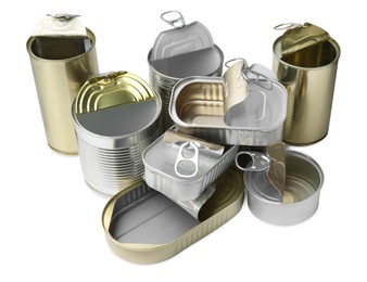 Photo of Many open tin cans isolated on white