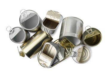 Photo of Many open tin cans isolated on white, top view