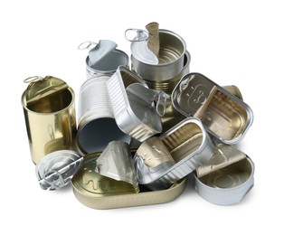 Photo of Many open tin cans isolated on white