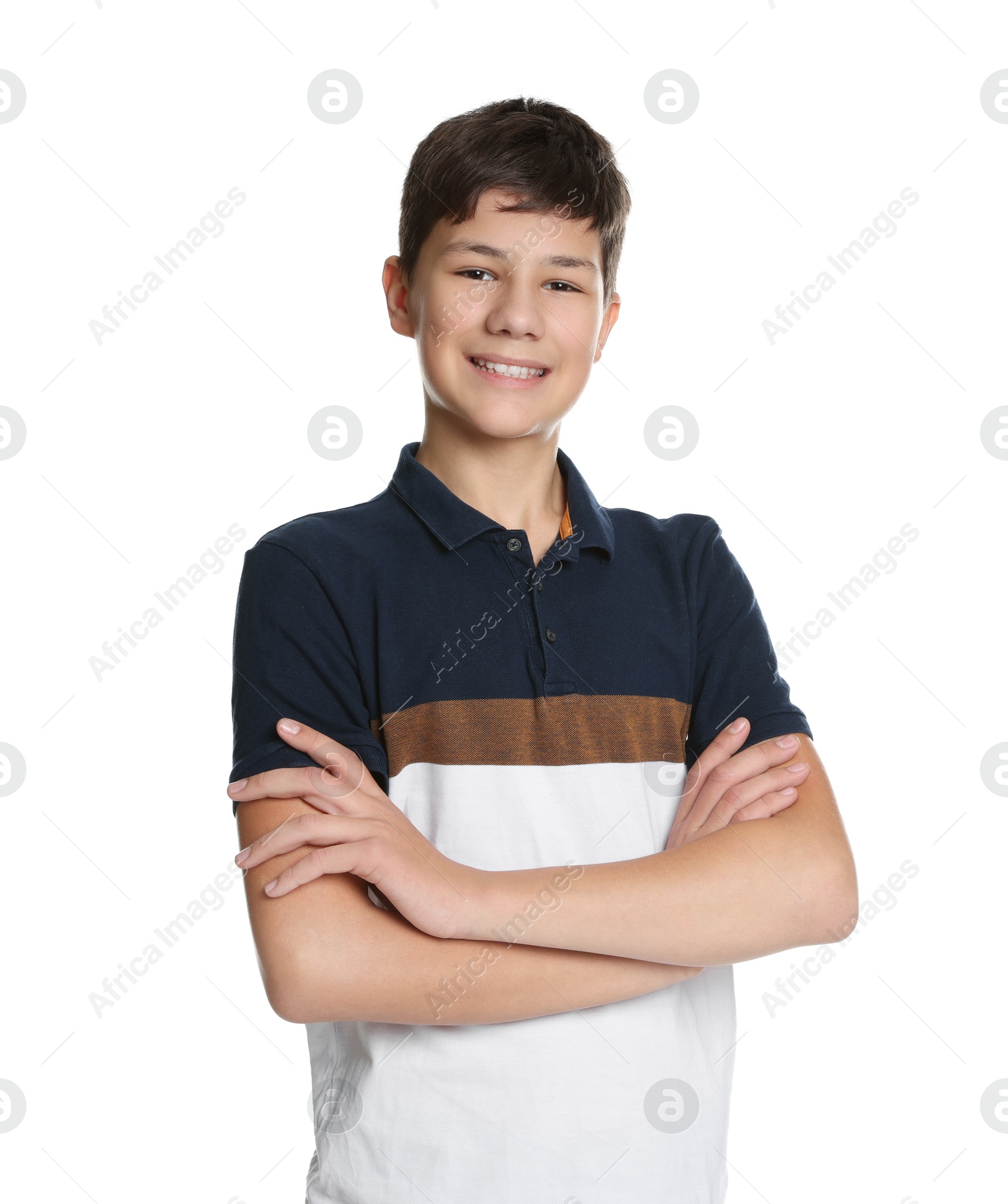 Photo of Portrait of teenage boy with crossed arms on white background