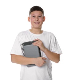 Photo of Portrait of teenage boy with books on white background