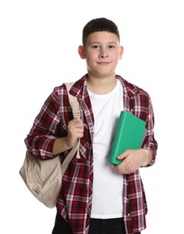 Photo of Portrait of teenage boy with books and backpack on white background