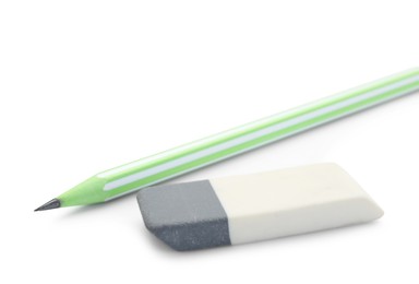 Eraser and pencil isolated on white. School stationery