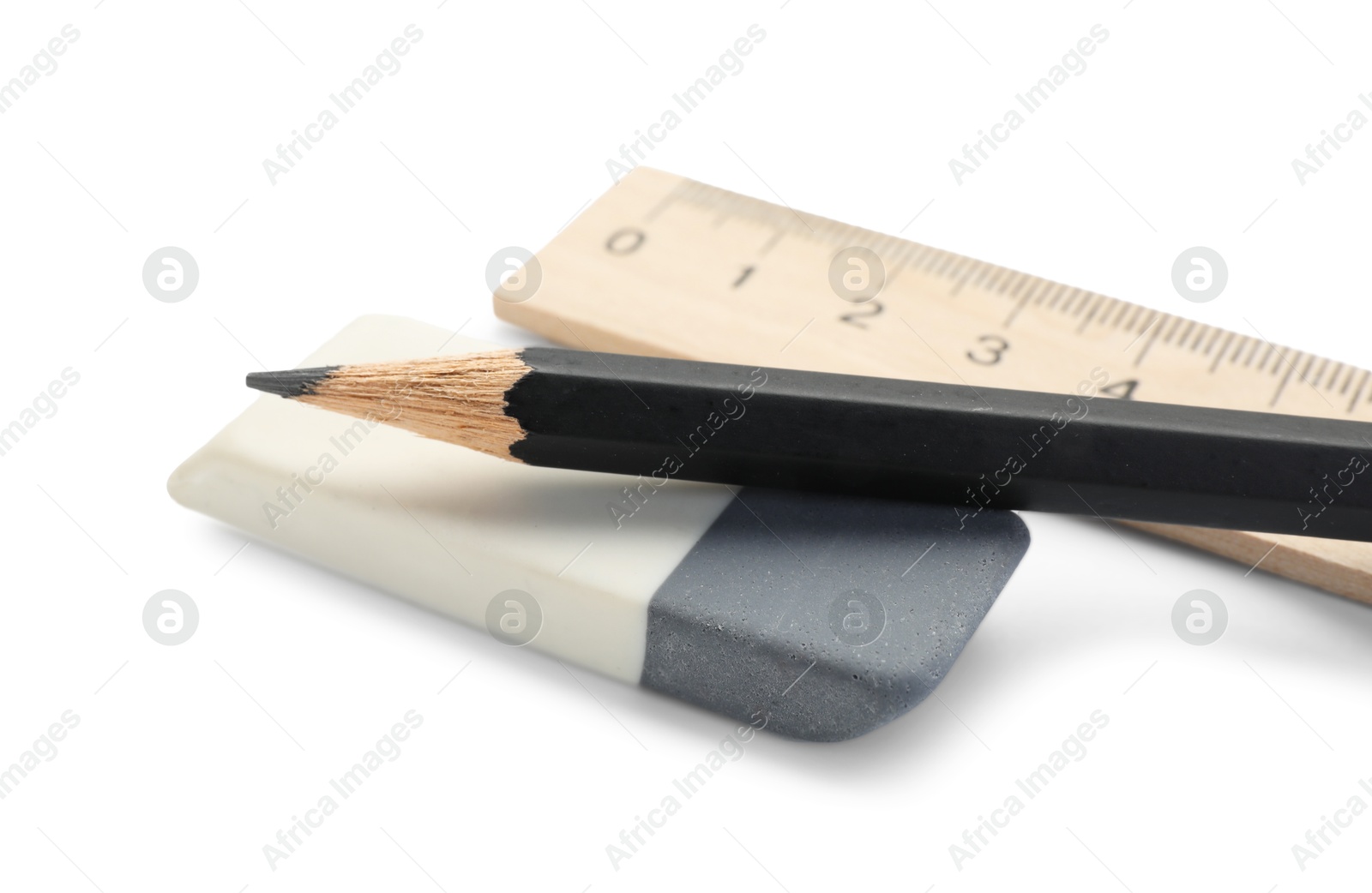 Photo of Eraser, ruler and pencil isolated on white