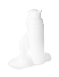 Photo of Bottle of cosmetic product with foam isolated on white