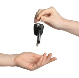 Photo of Dealer giving car key to customer on white background, closeup. Buying auto