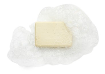 Photo of Soap with foam on white background, top view