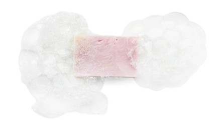 Photo of Soap with foam on white background, top view