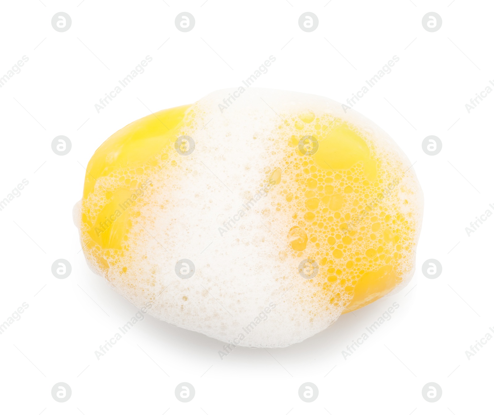 Photo of Yellow soap with foam on white background, top view