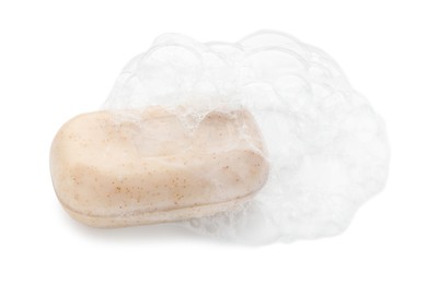 Photo of Bar soap with foam on white background