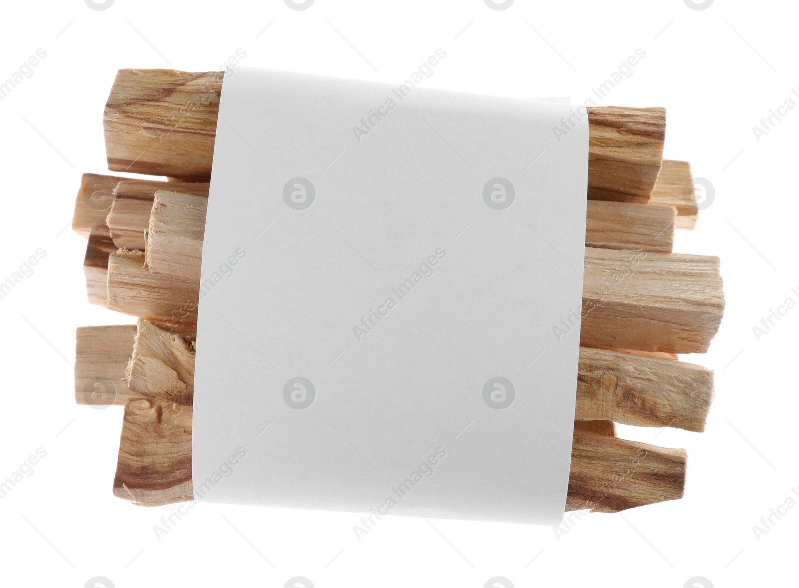 Photo of Palo santo sticks wrapped in paper on white background