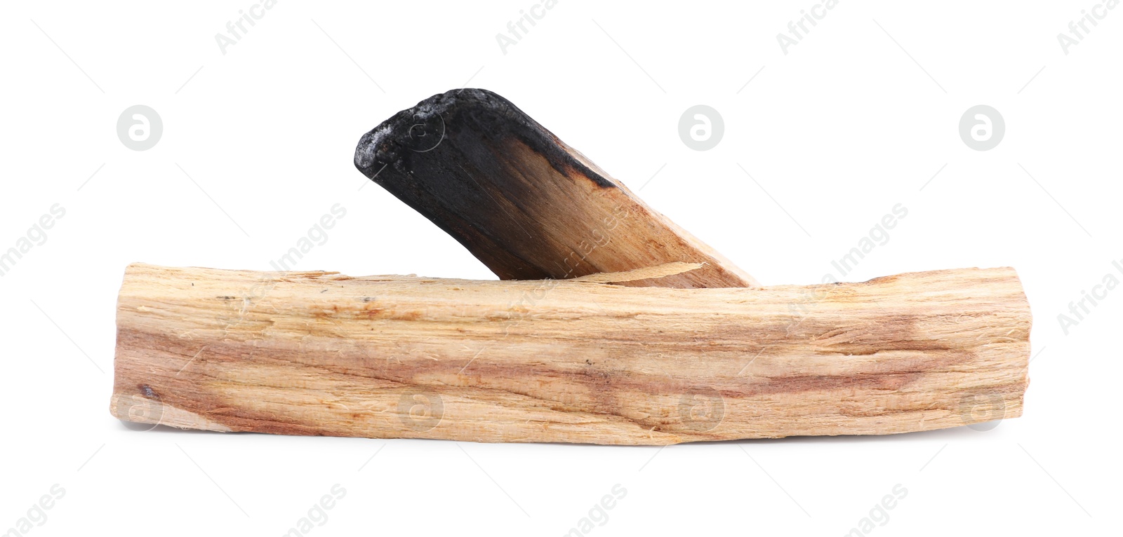 Photo of Whole palo santo stick and burnt one on white background