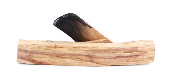 Photo of Whole palo santo stick and burnt one on white background