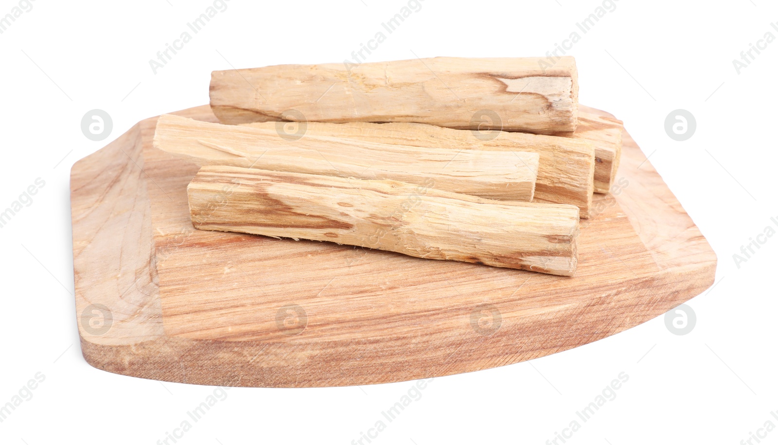 Photo of Many palo santo sticks on white background