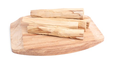 Photo of Many palo santo sticks on white background