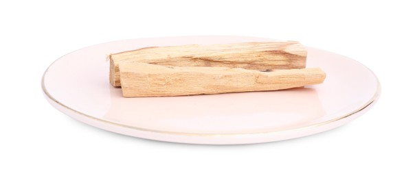 Photo of Two palo santo sticks on white background