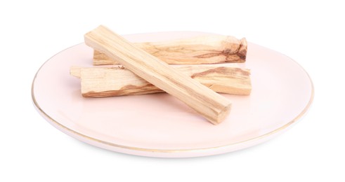 Photo of Three palo santo sticks on white background