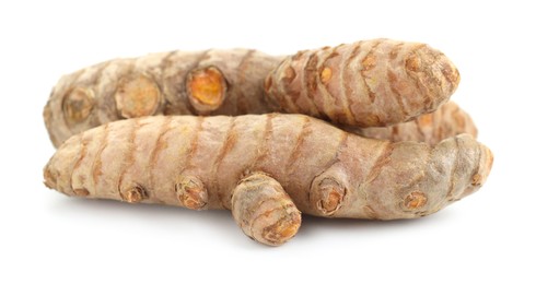 Photo of Two fresh turmeric roots isolated on white