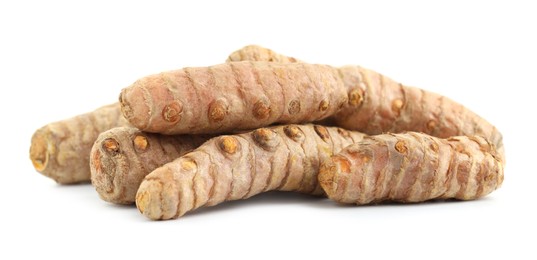 Photo of Pile of fresh turmeric roots isolated on white