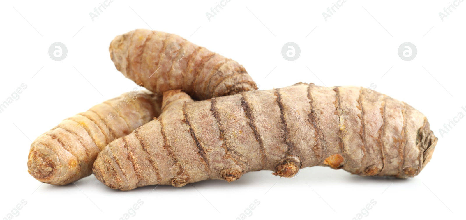 Photo of Three whole turmeric roots isolated on white