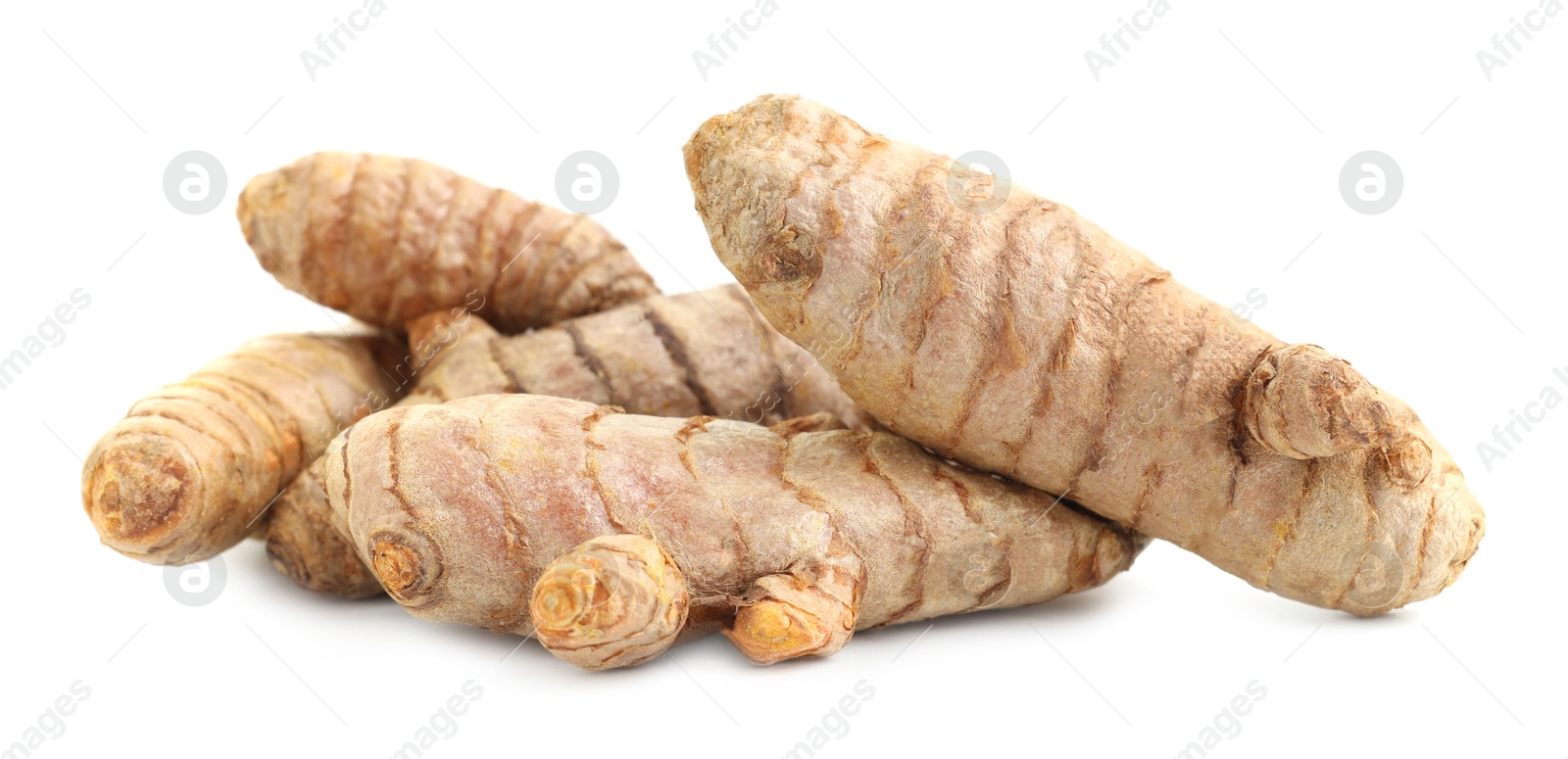 Photo of Pile of fresh turmeric roots isolated on white