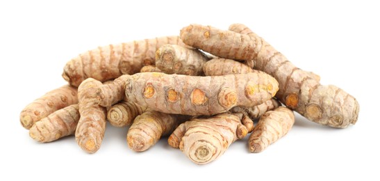 Photo of Pile of fresh turmeric roots isolated on white