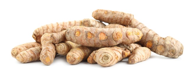 Photo of Pile of fresh turmeric roots isolated on white