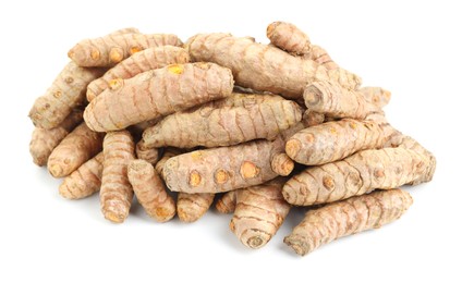 Photo of Pile of fresh turmeric roots isolated on white, above view