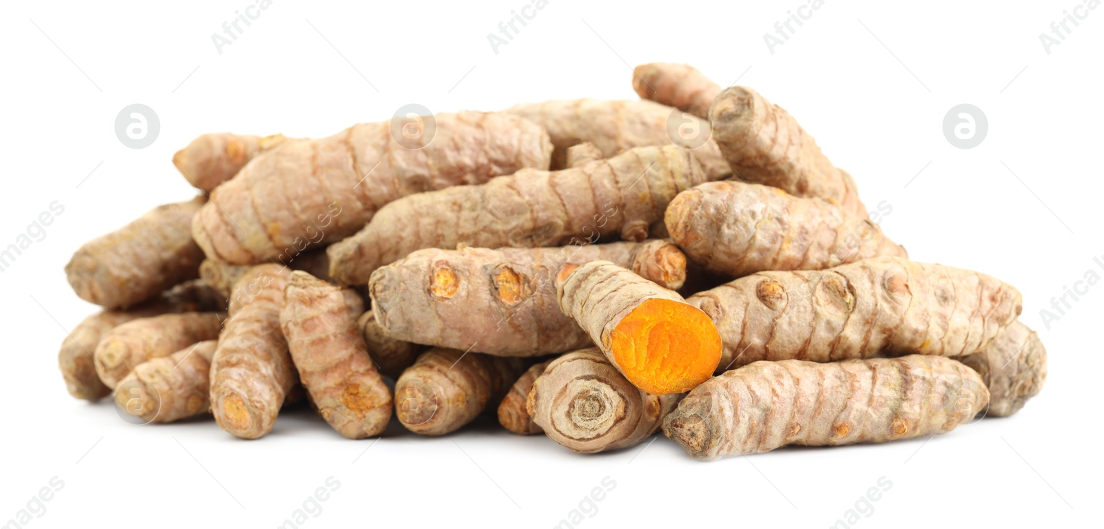 Photo of Pile of fresh turmeric roots isolated on white