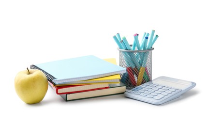 Photo of Doing homework. Notebooks, apple and stationery on white background