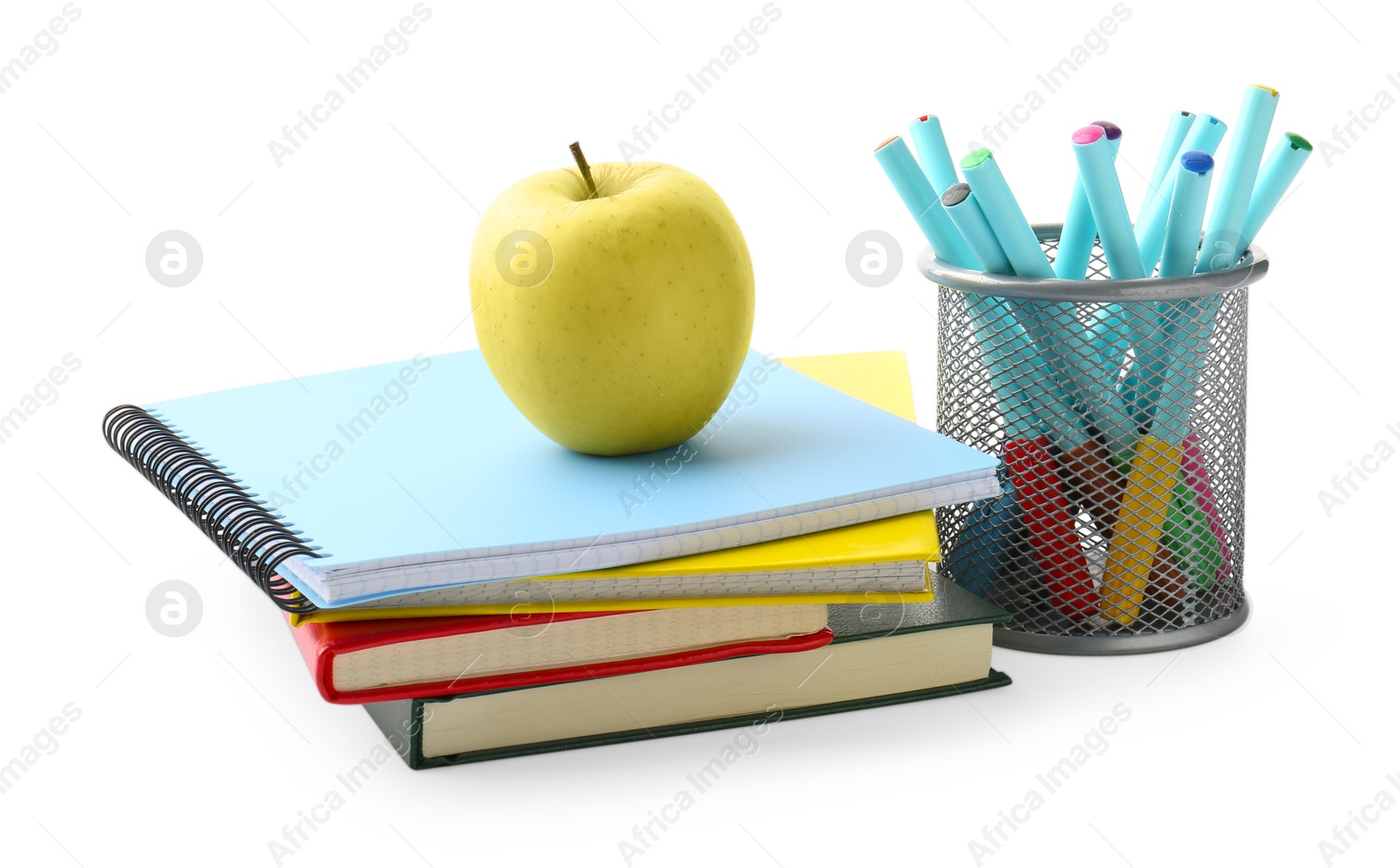 Photo of Doing homework. Notebooks, apple and stationery on white background