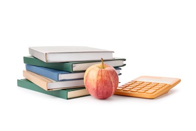 Photo of Stack of books, calculator and apple isolated on white