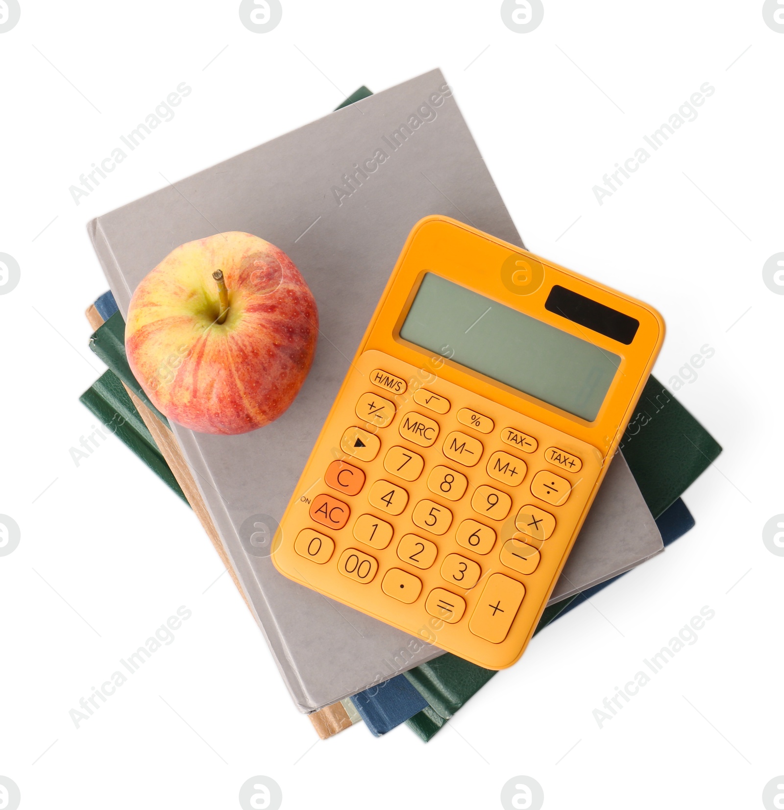 Photo of Stack of books, calculator and apple isolated on white, top view