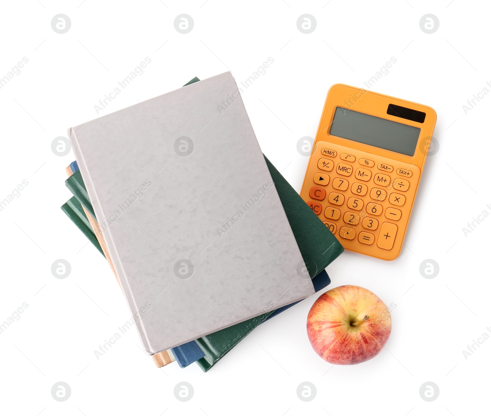 Photo of Stack of books, calculator and apple isolated on white, top view