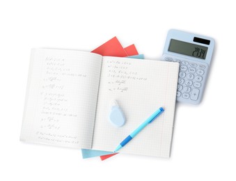 Photo of Doing homework. Notebook with math assignment and stationery on white background, top view