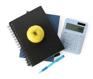 Photo of Notebooks, apple, pen and calculator isolated on white, top view