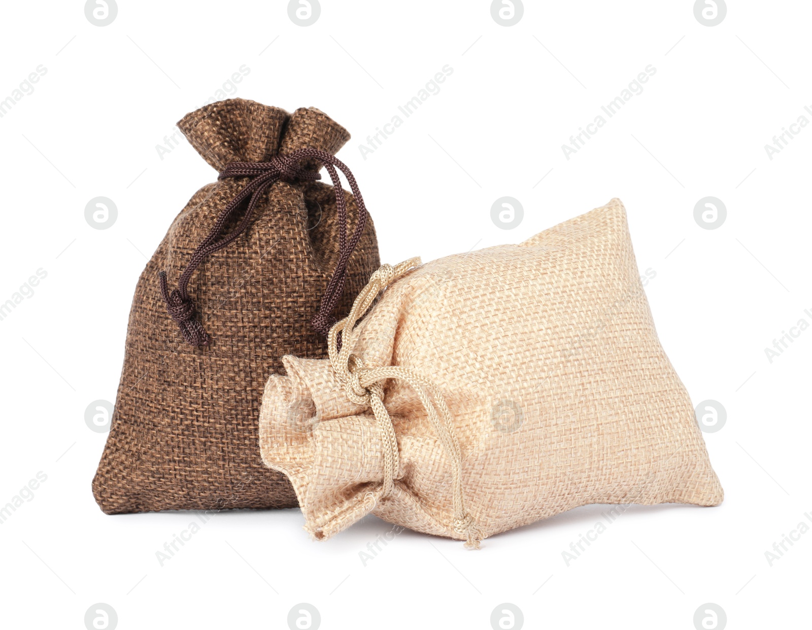 Photo of Two small burlap sacks isolated on white