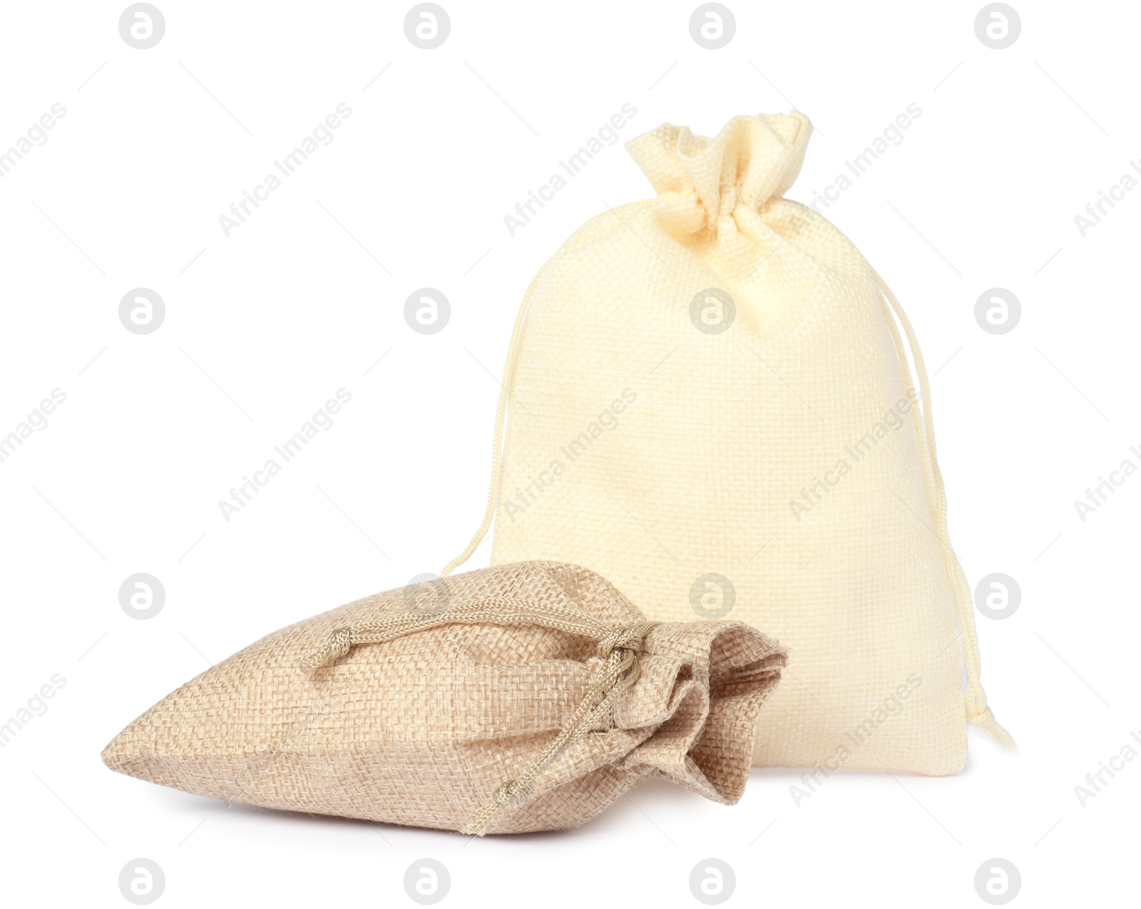 Photo of Two beige burlap sacks isolated on white