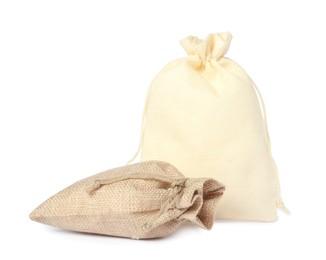 Photo of Two beige burlap sacks isolated on white