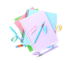 Photo of Doing homework. Notebooks and other different stationery on white background, top view