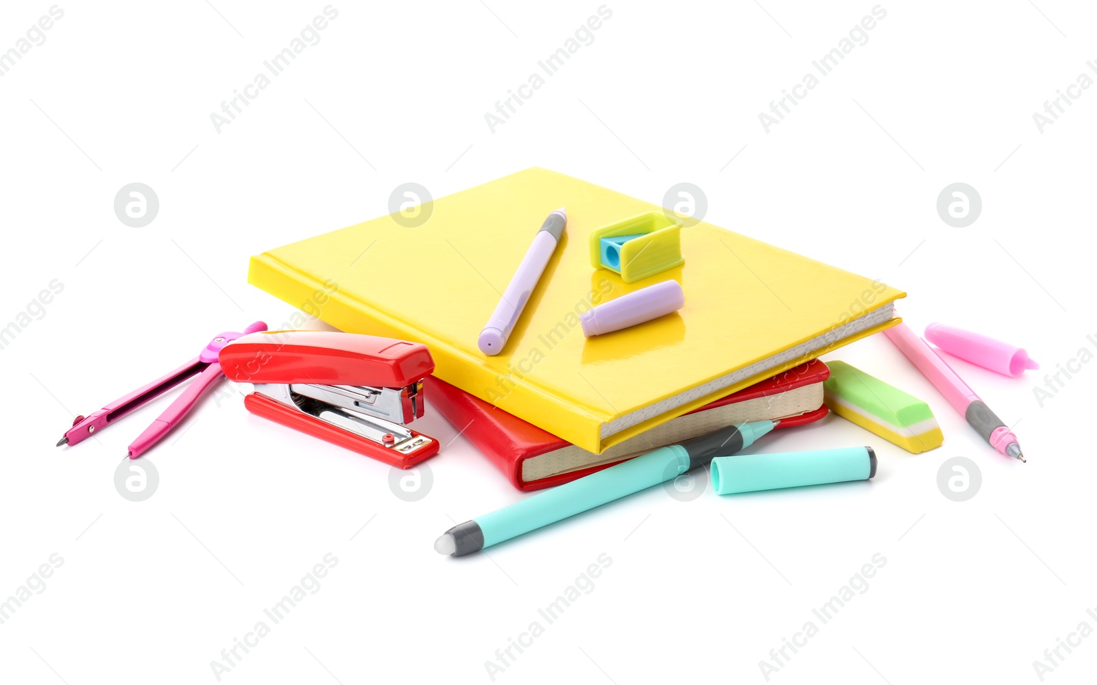 Photo of Doing homework. Notebooks and other different stationery on white background