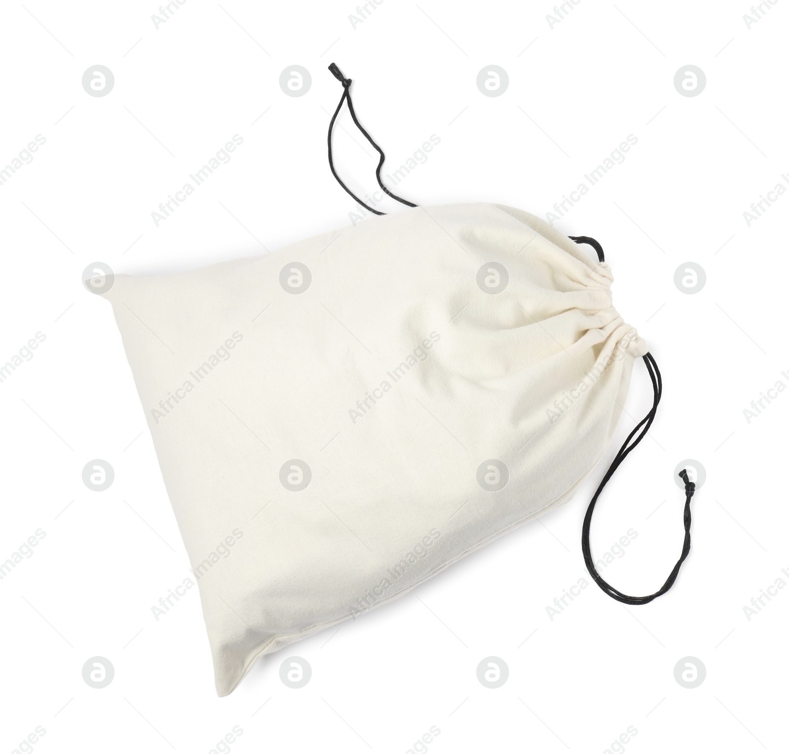 Photo of One cotton bag with ties isolated on white, top view