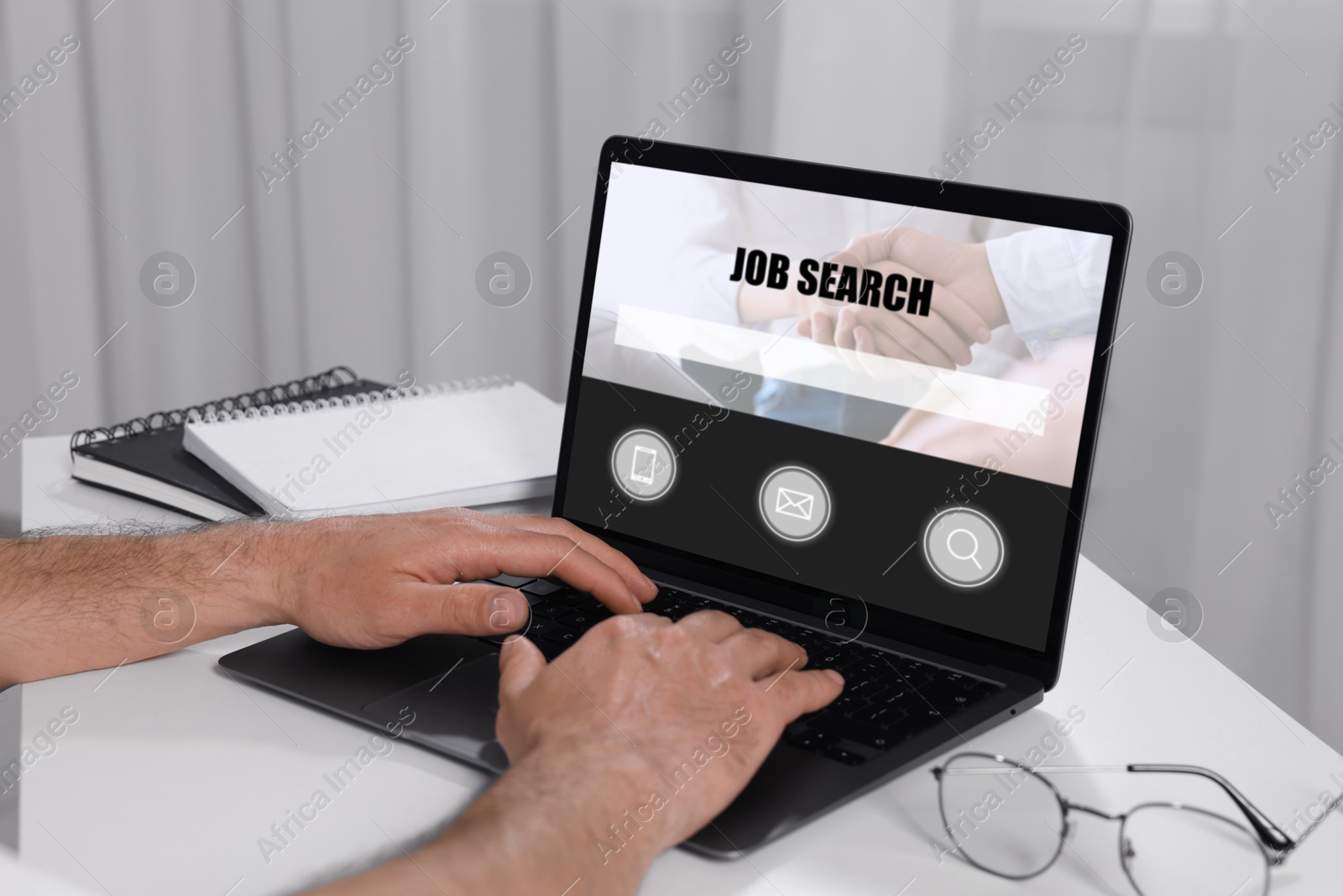 Image of Job search. Man using employment website on laptop at home, closeup