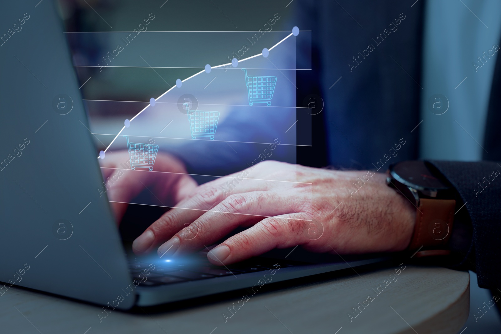 Image of Man tracking price growth using laptop, closeup. Graph over device. Internet shopping concept