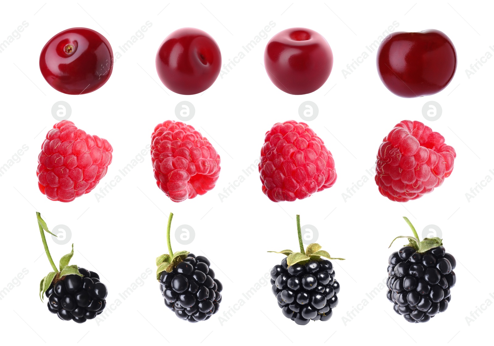 Image of Cherries, raspberries and blackberries isolated on white