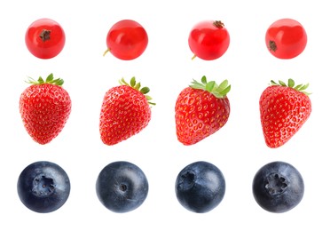 Image of Blueberries, strawberries and redcurrant berries isolated on white