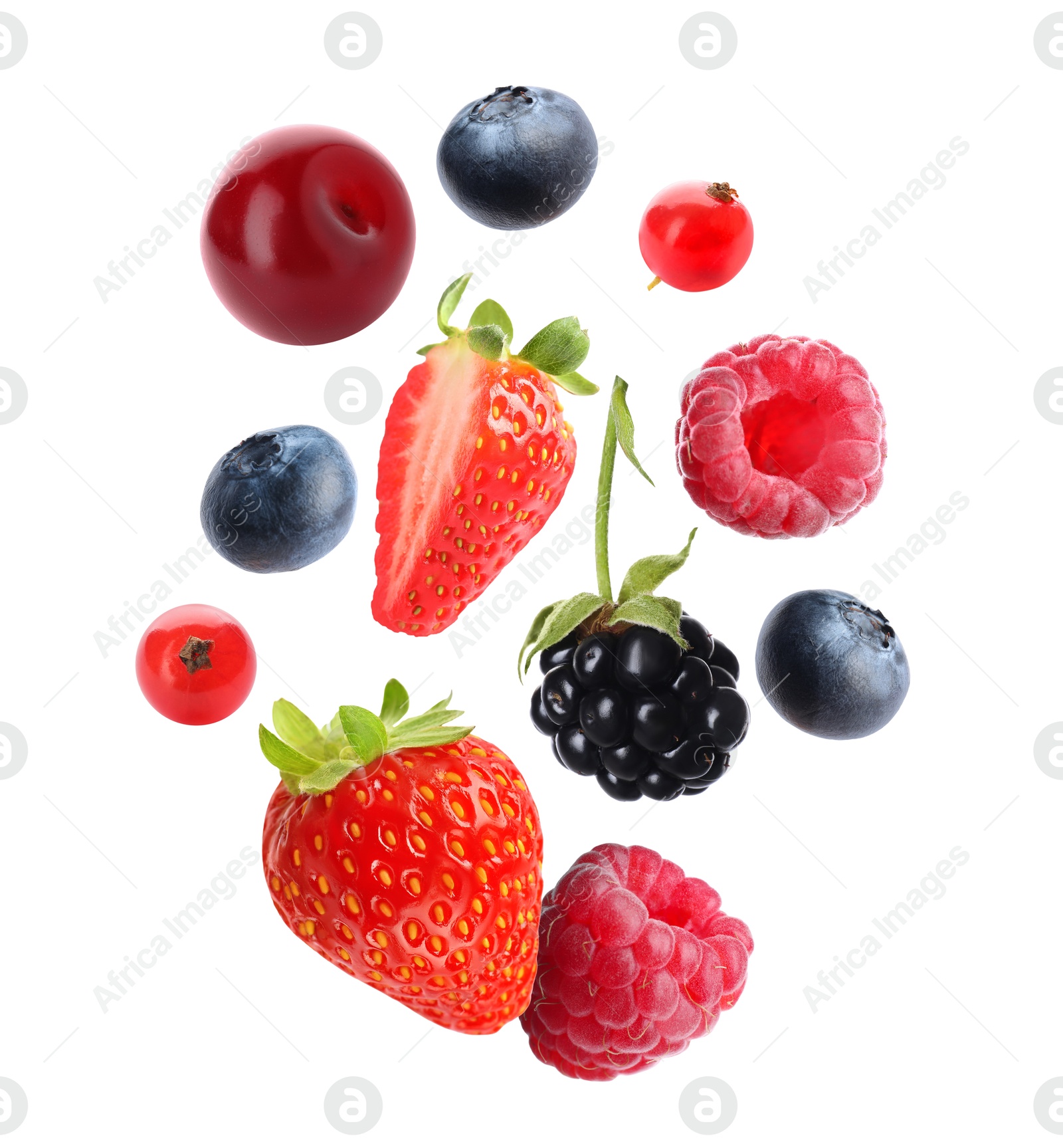 Image of Blueberries, cherries, raspberries, blackberry, strawberries and redcurrant berries in air on white background